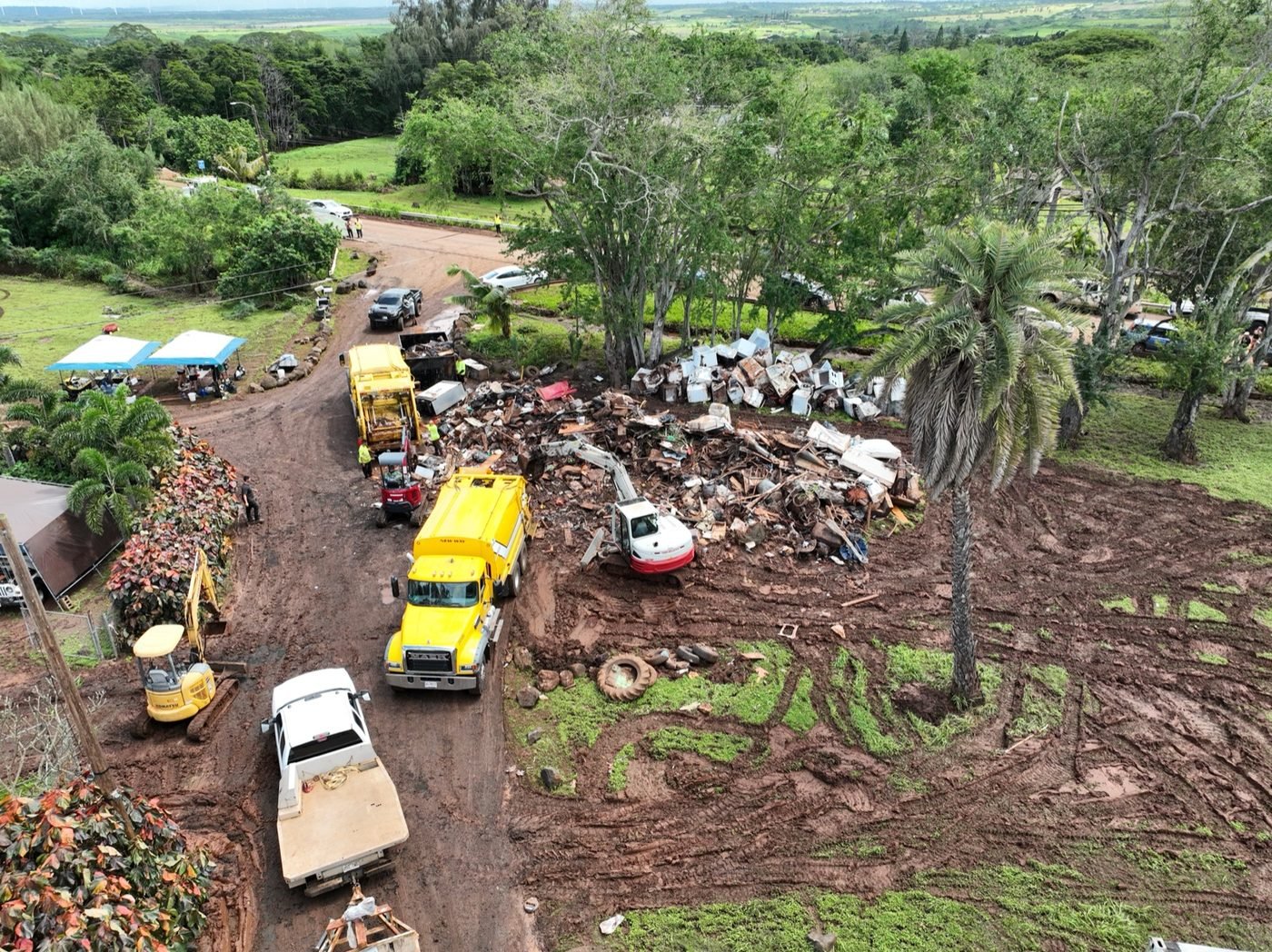 Drone view of crews cleaning up a flood-damaged property on the North Shore of Oʻahu, March 23, 2026
