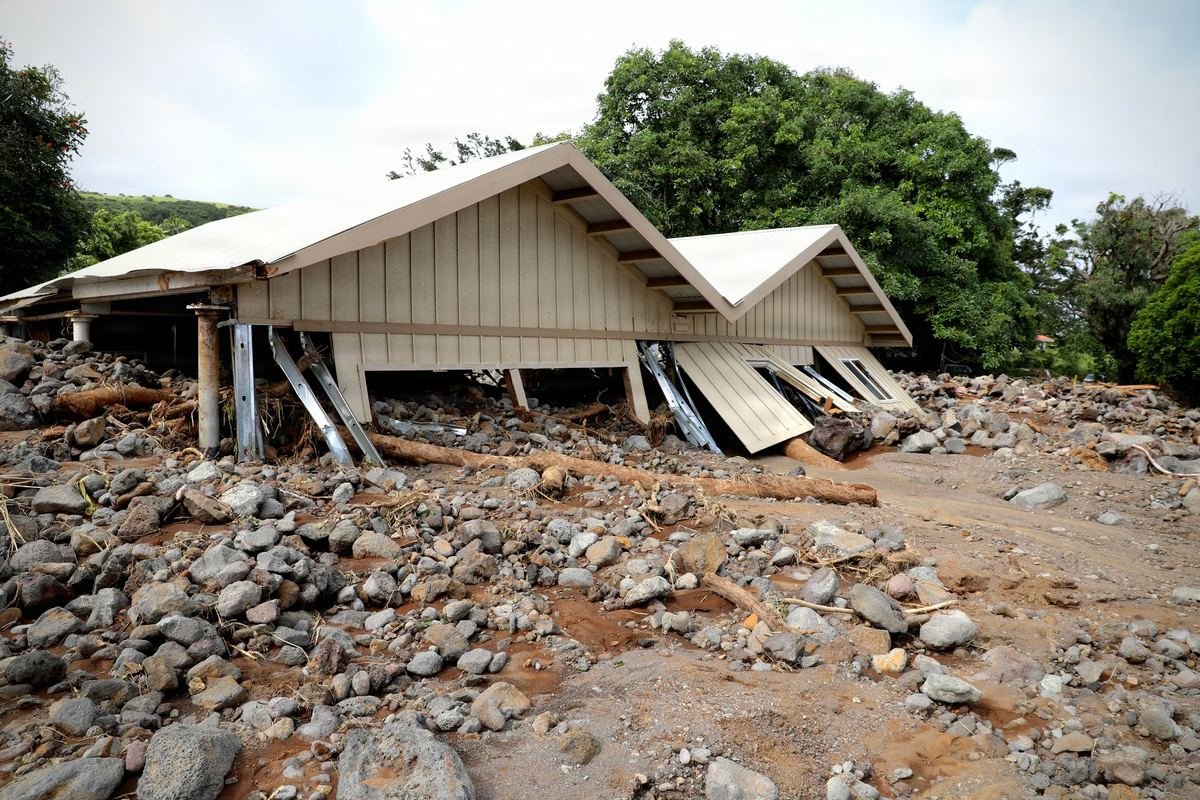 A Hawaii home knocked off its foundation by a Hurricane Lala debris flow