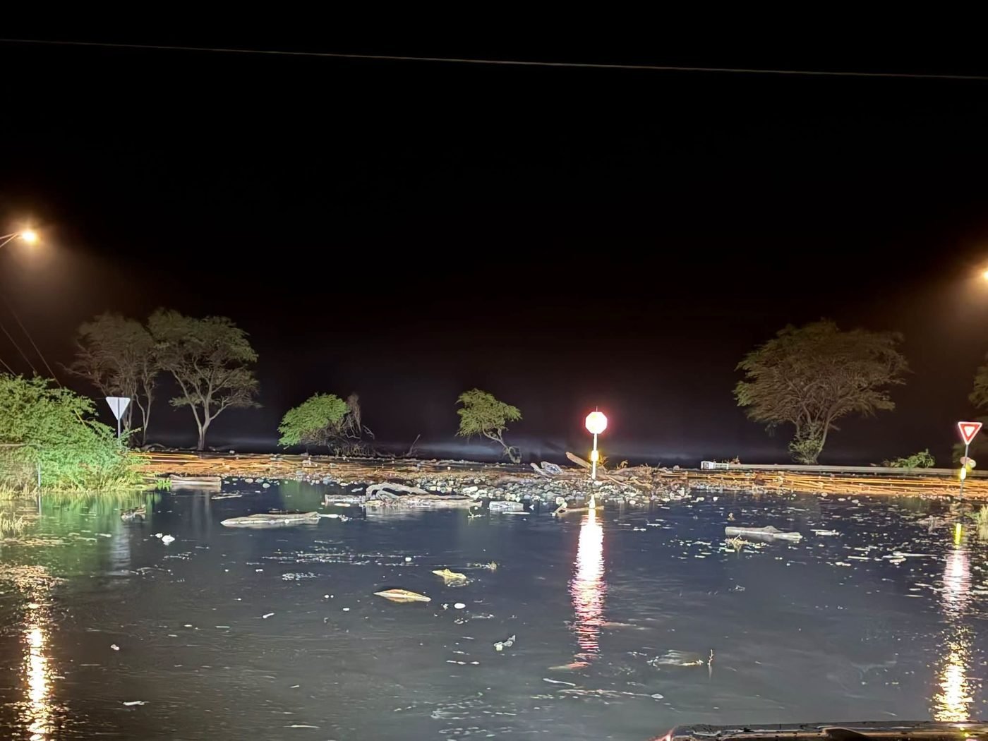 High surf sending water over Honoapiʻilani Highway between Lone Pine and Māʻalaea, Maui